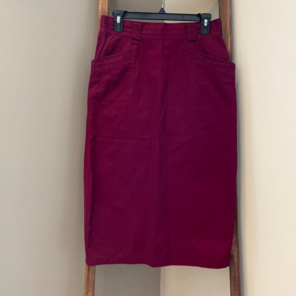 Wine colored pencil skirt.